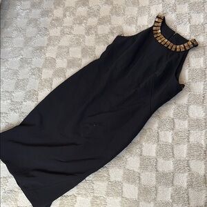 Elegant Black Sleeveless Dress with Gold Accents